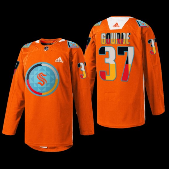 Seattle Kraken Yanni Gourde #37 Indigenous People Night Jersey Orange Warmup